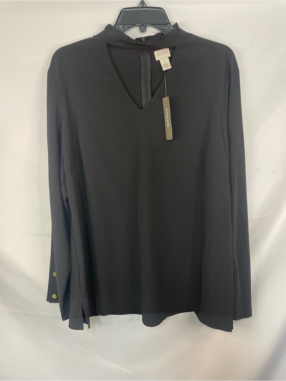 NWT Chicos black blouse with a cutout neck line and gold accents. Size 2 - Picture 1 of 7